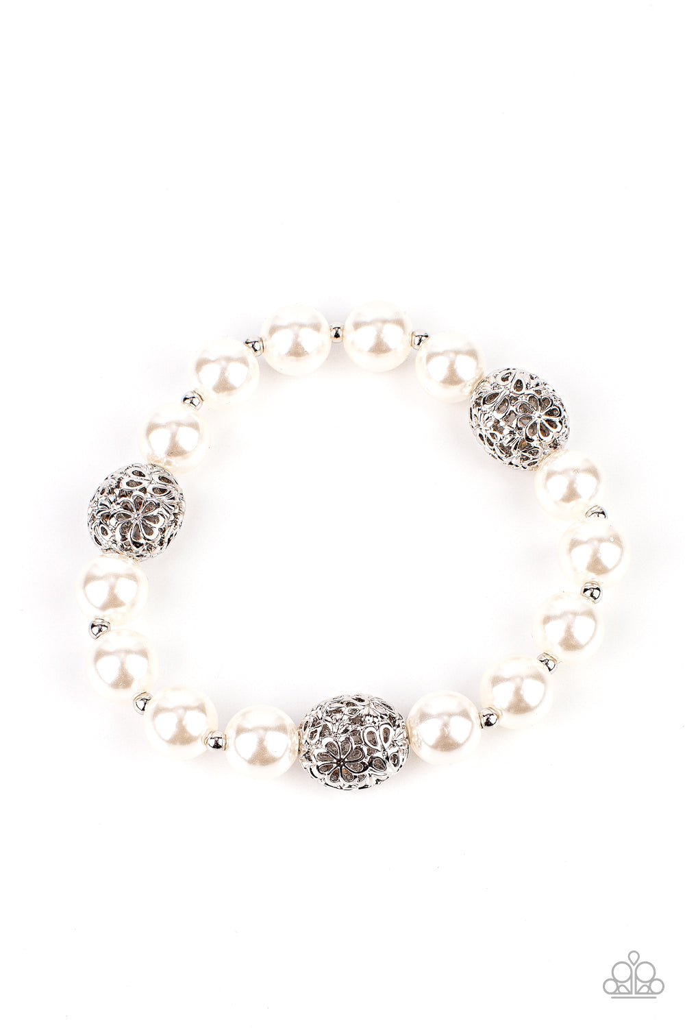 Airy silver beads, featuring a floral filigree design, add a touch of whimsy to a strand of luminous white pearl-like beads