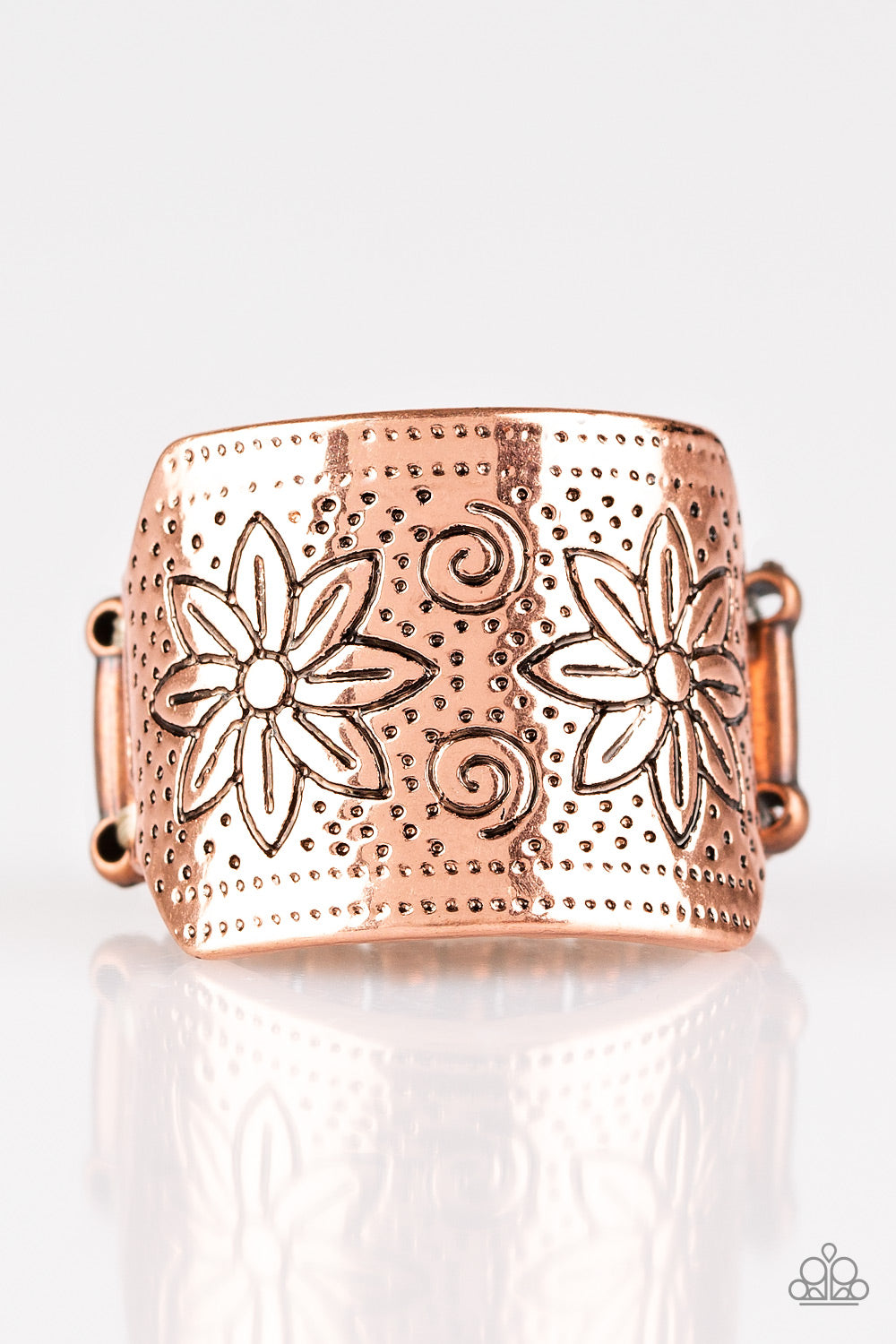 floral detail, a thick copper band 