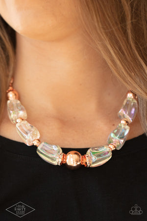 icy iridescence, glassy asymmetrical beads join a mismatched collection of shiny copper beads, white rhinestone encrusted rings, and scalloped shiny copper accents below the collar