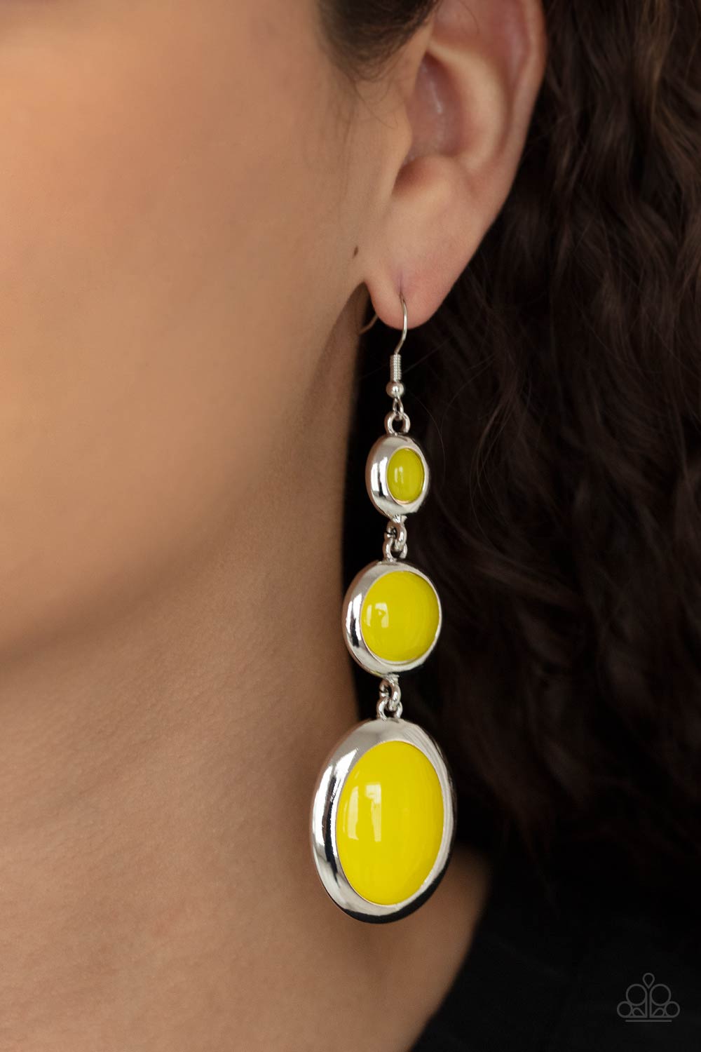 Glassy yellow beads encased in sleek silver frames