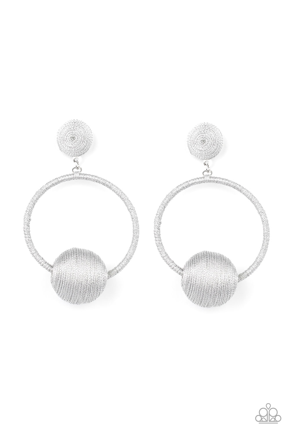 Shimmery silver thread wraps around an oversized bead that is fitted in place along the bottom of a matching threaded hoop