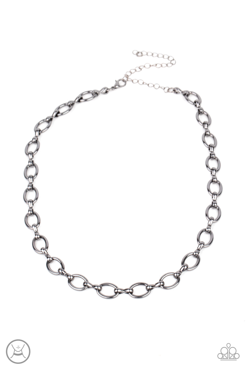 A collection of oversized gunmetal ovals and glistening gunmetal fittings interlock around the neck, creating an intense industrial look