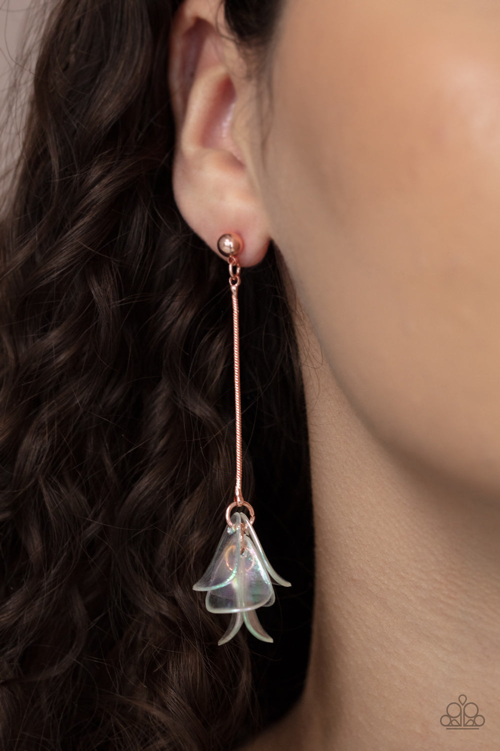 Iridescent acrylic petals delicately cluster at the bottom of a shiny copper chain, creating an ethereal tassel.