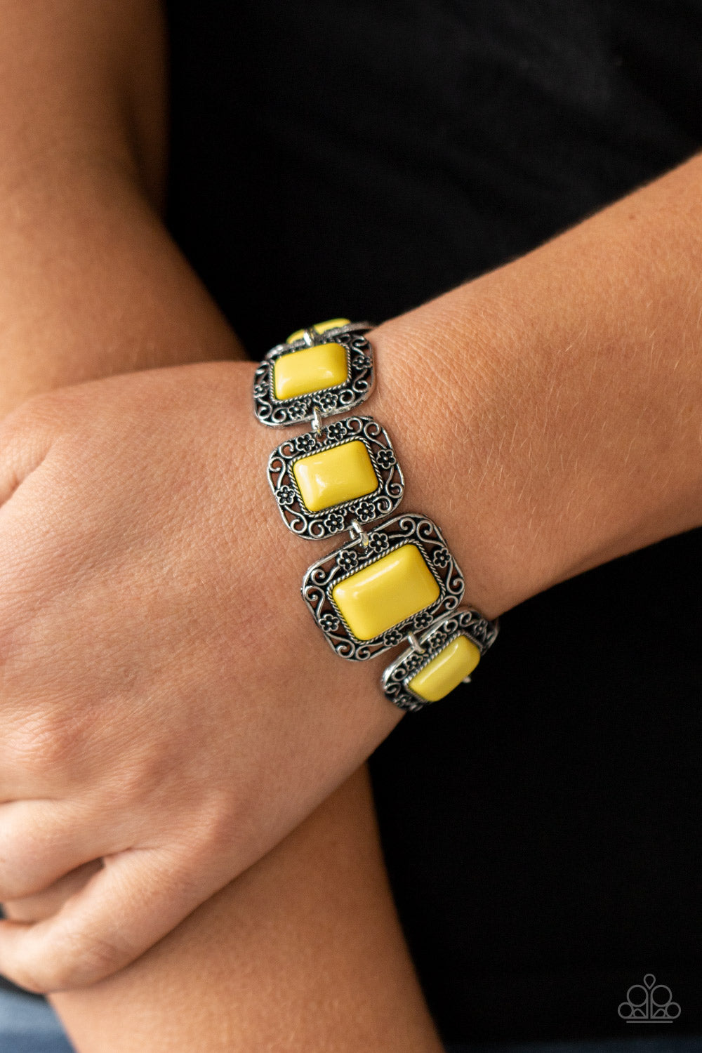 rectangular beads are bordered by rustic floral filigree filled frames