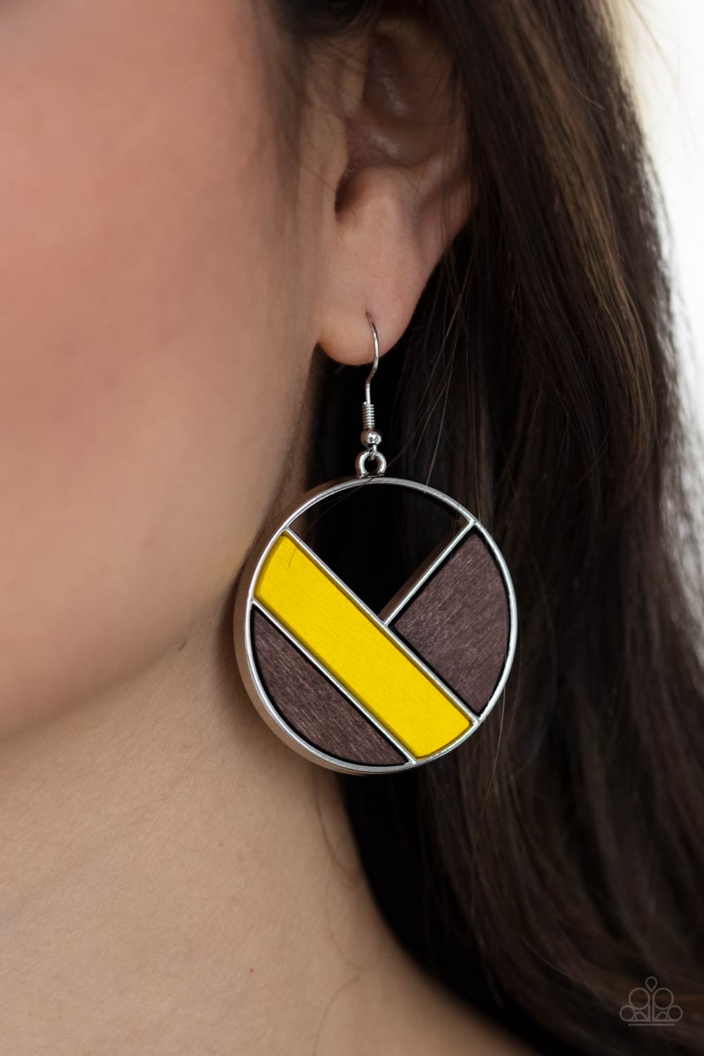 yellow and brown finishes, geometric wooden frames piece together inside an airy silver hoop