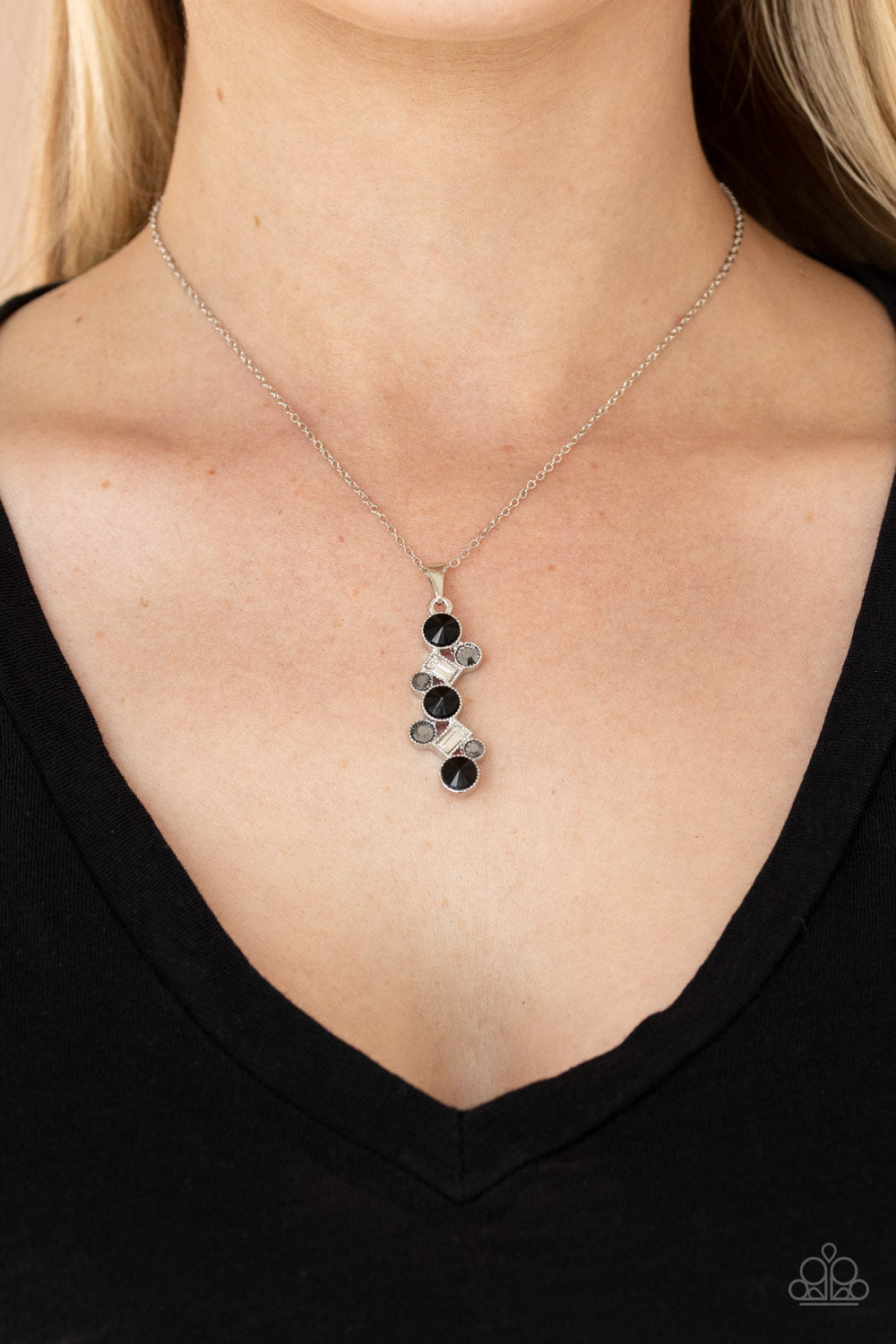 classic round and regal emerald style cuts, a glittery collection of black, hematite, and white rhinestones 