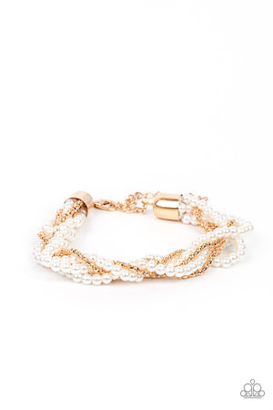 Capped in gold fittings, strands of bubbly white pearls and dainty gold popcorn chains