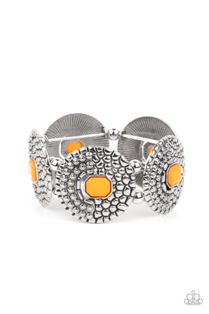 Marigold emerald shaped beads adorn the centers of round silver discs studded and embossed in metallic croc-like textures