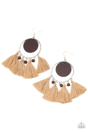 wooden disc swings from the top of a shiny silver hoop that is adorned in dainty wooden cube beads and Desert Mist threaded tassels