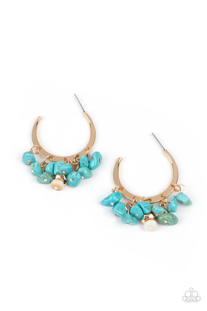 Clusters of turquoise pebbles swing from the bottom of a dainty gold hoop, creating an earthy fringe. A faceted gold and white stone bead swings from the center, adding an ethereal edge