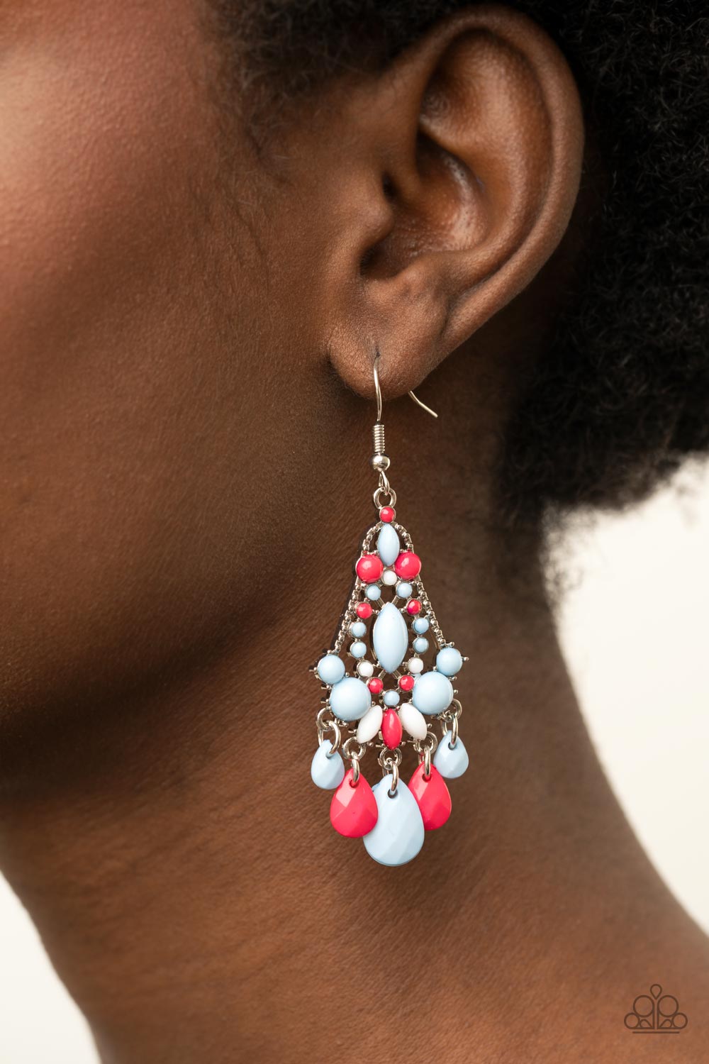 bubbly Cerulean, white, and Raspberry Sorbet beads decoratively adorn the front of a studded silver frame