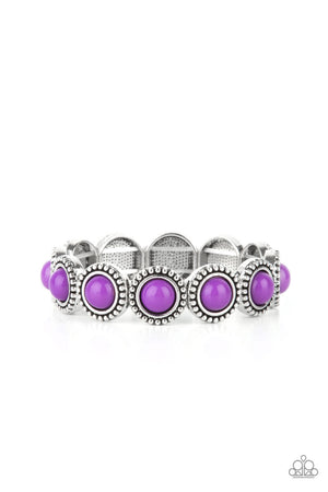 antiqued silver studded edge, silver frames encase polished purple beads