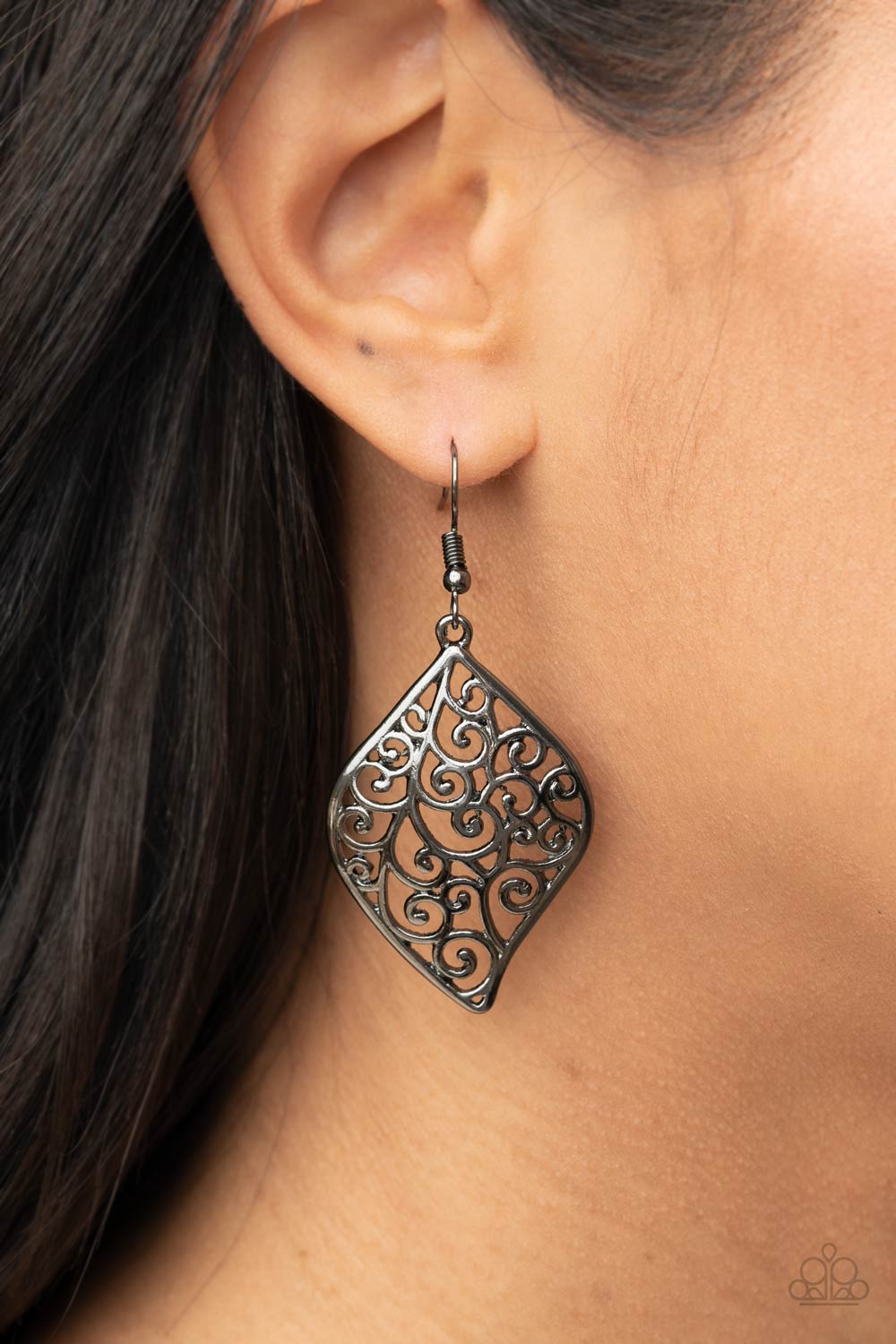 Gunmetal floral filigree vines permeate a refreshing leaf-shaped frame,