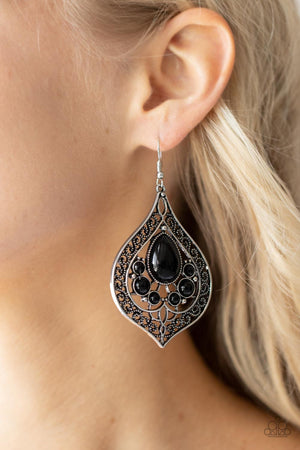Bordered in vine-like filigree, the center of an airy silver teardrop frame is dotted in bubbly black beads for an enchanting pop of color.