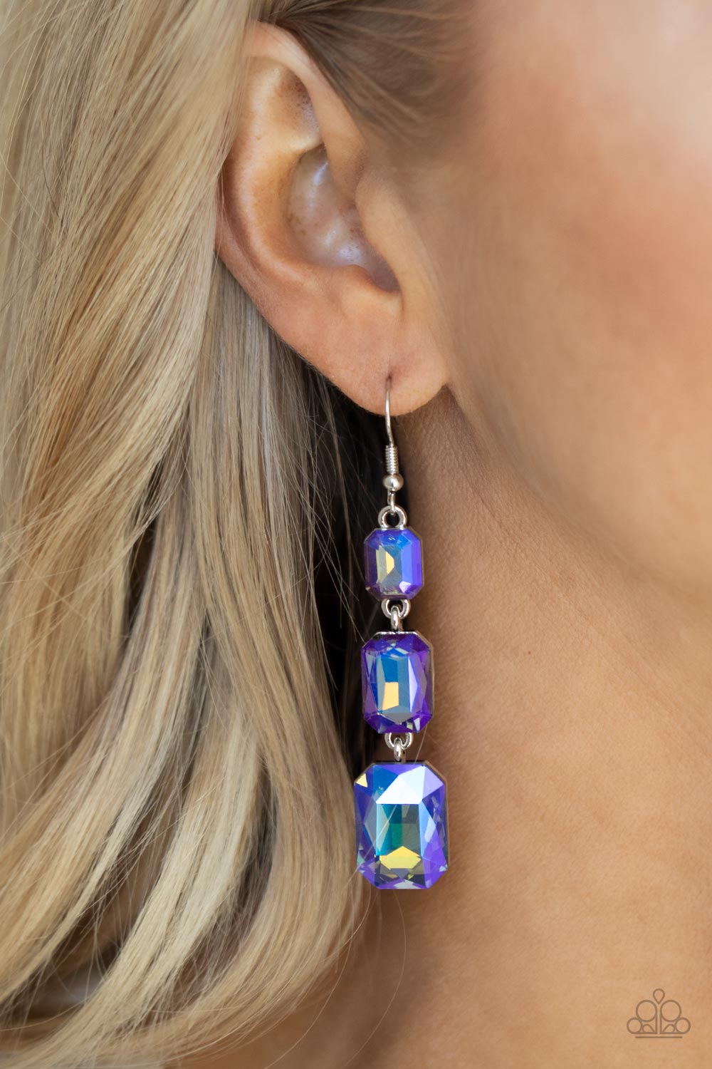 dazzling blue and gold UV shimmer, a trio of emerald-cut gems in graduating sizes