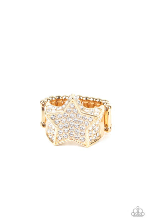 glittery white rhinestones, a sparkly gold star joins with a thick band of blinding white rhinestones