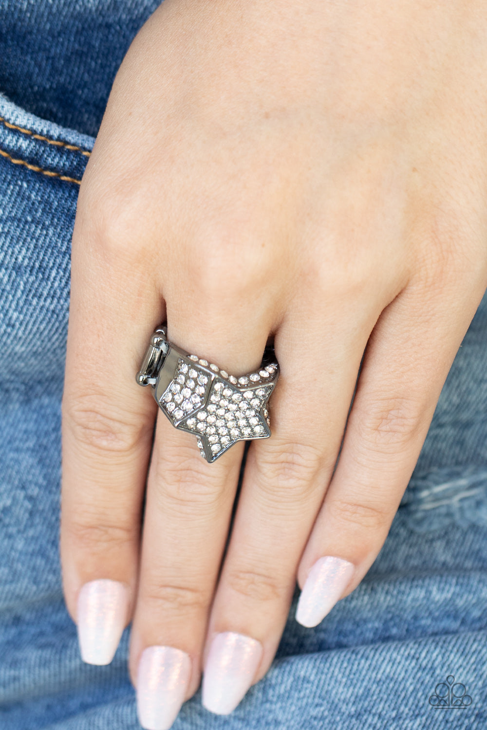 Encrusted in glittery white rhinestones, a sparkly gunmetal star joins with a thick band of blinding white rhinestones.