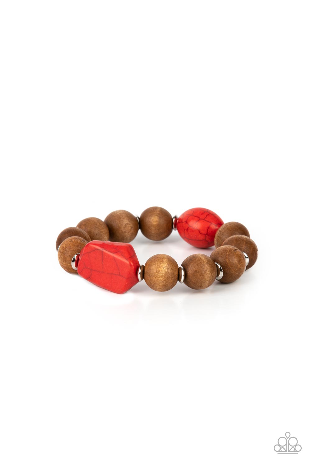 Oversized brown wooden beads and mismatched red stone accents are separated by dainty silver discs and threaded along a stretchy band