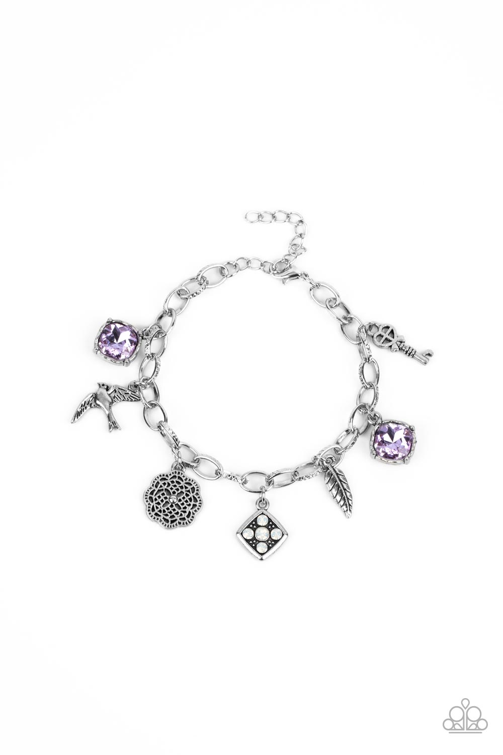Sparkling purple gems, a floral medallion, a bird in flight, and a fluttering feather dangle from a delicate silver chain