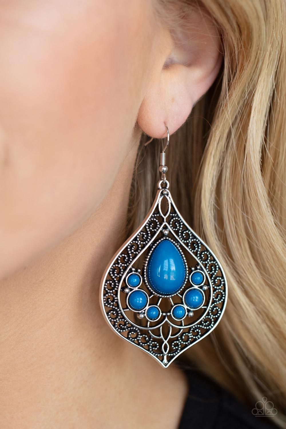 Bordered in vine-like filigree, the center of an airy silver teardrop frame is dotted in bubbly Mykonos Blue beads 