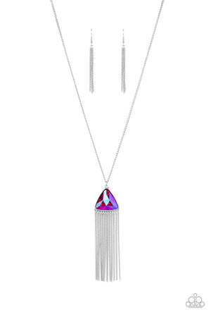 a UV shimmer, an oversized pink triangular gem swings from the bottom of a lengthened silver chain. A curtain of silver chains streams out from the bottom of the sparkly pendant