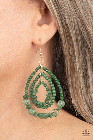 mismatched green stone, seed bead, crystal-like, and faux stone beads are threaded along three dainty wires that connect into a colorful teardrop lure