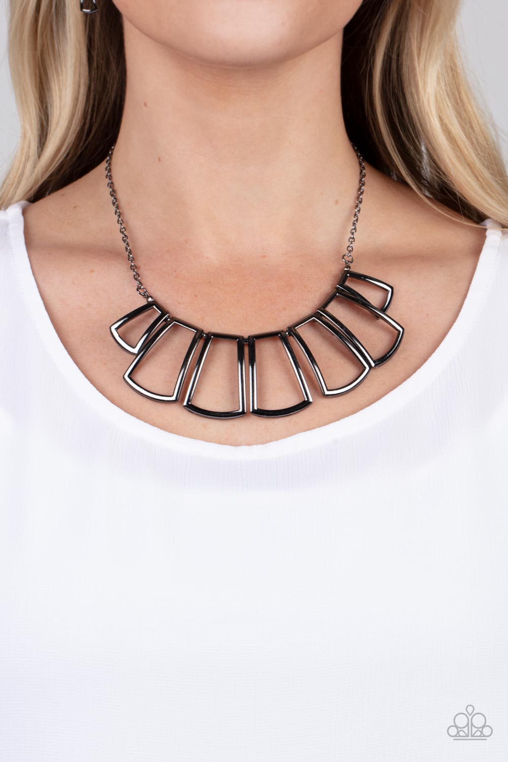 flared rectangular gunmetal frames fan out below the collar
