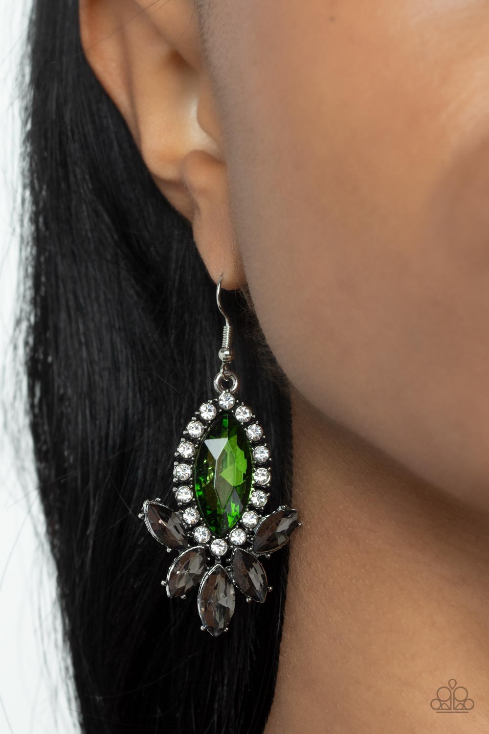 smoky marquise cut rhinestones flares out from the bottom of an oversized green marquise cut rhinestone that is bordered in dainty white rhinestones