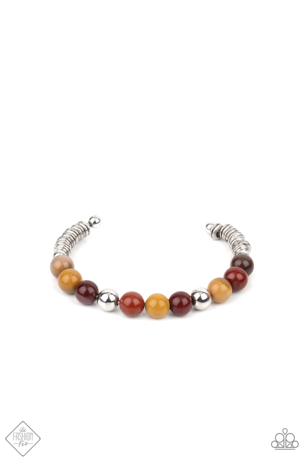 Accented with shiny silver beads, a collection of polished multicolored stone beads are fashioned into a wire cuff bracelet