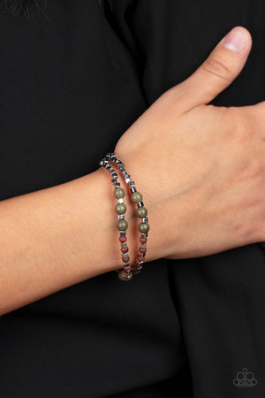 earthy assortment of Olive stone, wood, and silver cube beads are threaded along stretchy bands 