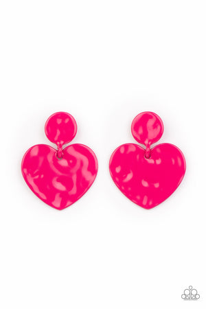 Painted in a glossy Fuchsia Fedora finish, a hammered disc gives way to a hammered heart frame 