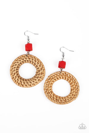 A wicker-like hoop swings from the bottom of a faceted red wooden bead, adding an earthy twist to the trendy homespun trinket