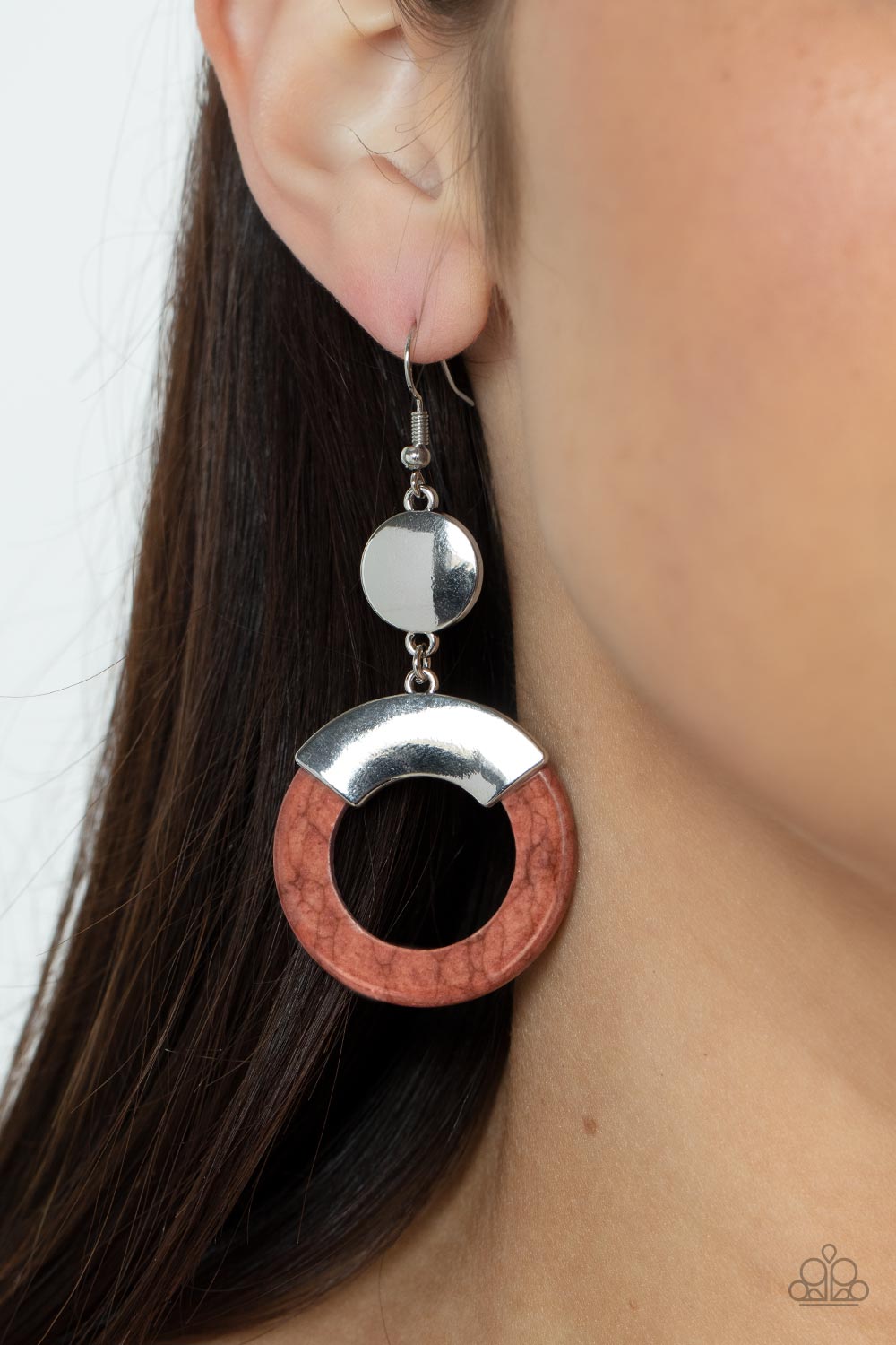 Capped in a curved silver plate, an earthy brown stone hoop swings from the bottom of a shiny silver disc for an authentic artisan twist