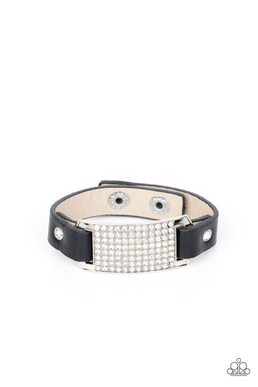 Black leather bands are looped through the ends of a white rhinestone embellished silver frame and studded in place with glitzy white rhinestone studs