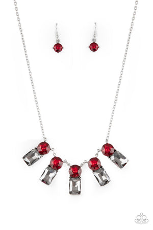 sparkly row of oversized red gems regally sit atop emerald cut smoky rhinestone bases as they delicately link along a dainty silver chain below the collar