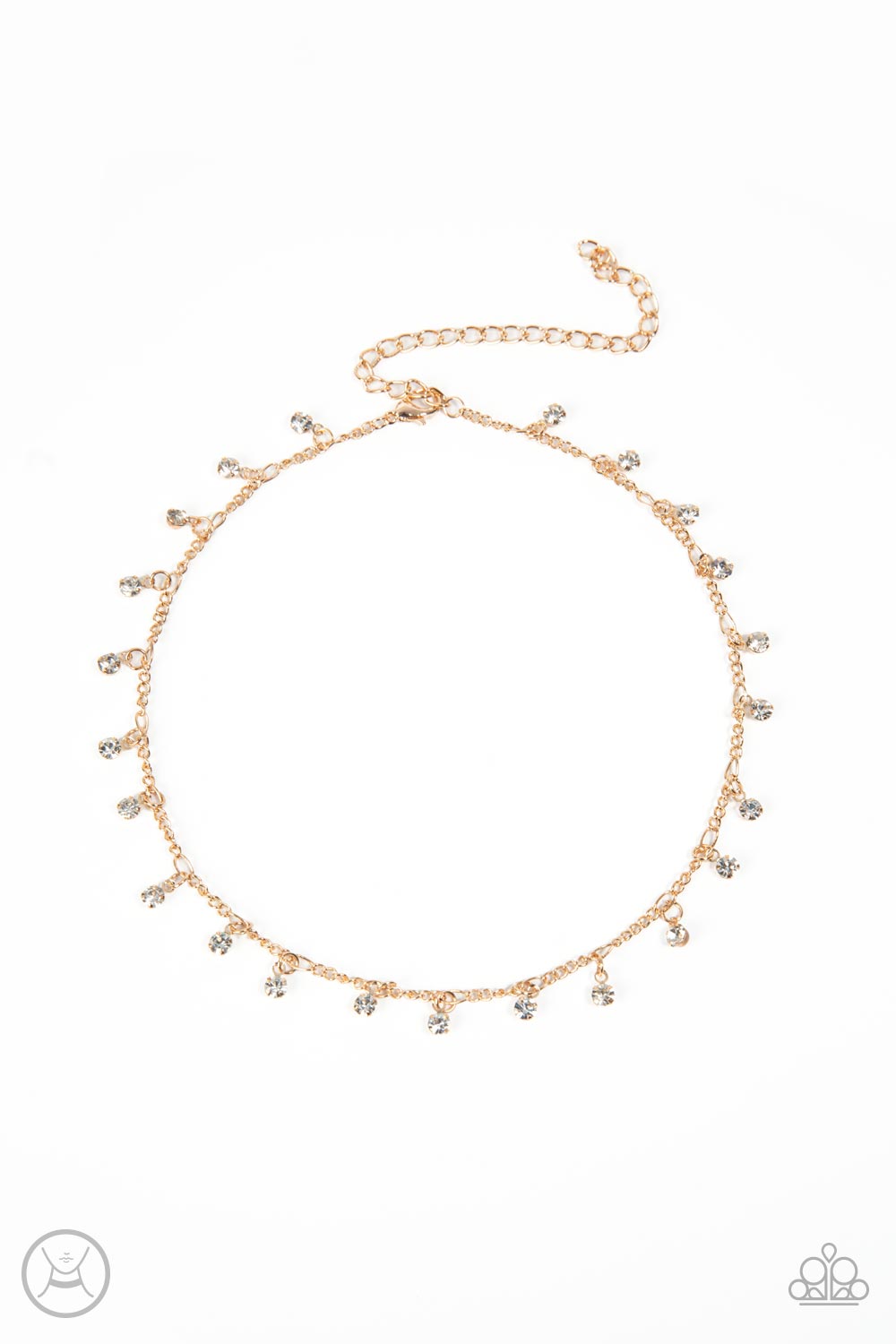 Glassy white rhinestones swing from a dainty gold chain around the neck