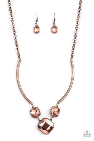 oversized collection of coppery aurum and glassy coppery gems delicately link at the bottom of two curved copper rods