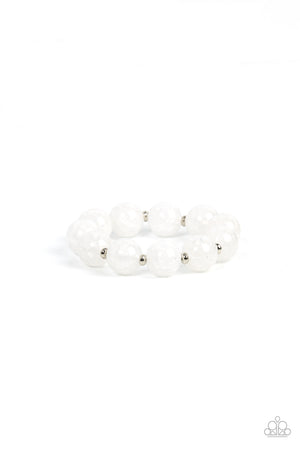 Infused with dainty silver accents, an oversized collection of crackly white glass-like beads are threaded along stretchy bands