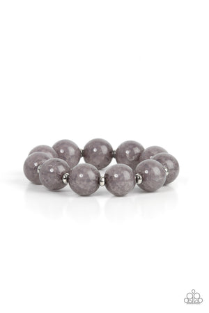 dainty silver accents, an oversized collection of crackly gray glass-like beads are threaded along stretchy bands