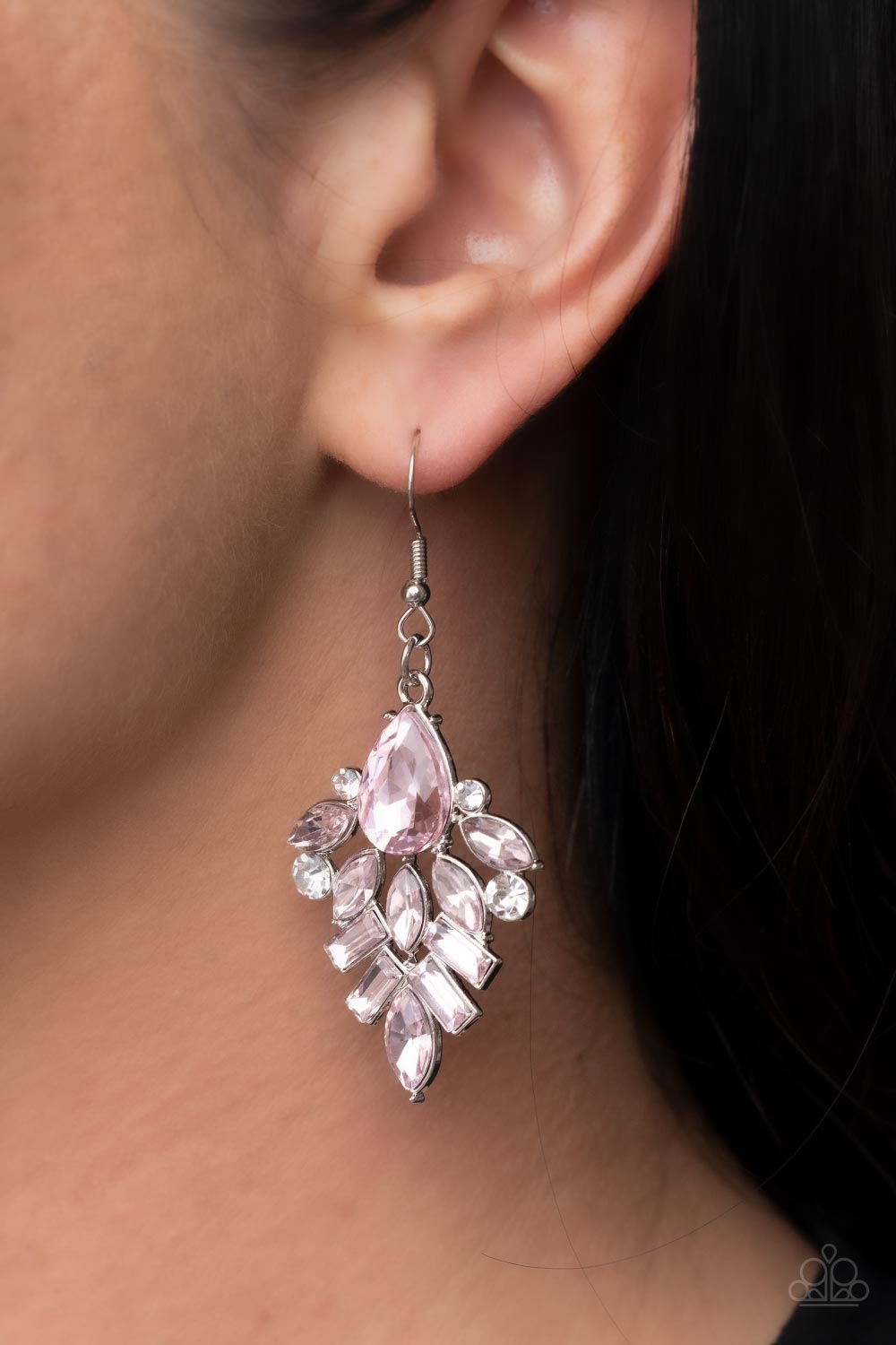 white rhinestones are sprinkled between a stunning stack of emerald, teardrop, and marquise cut pink rhinestone