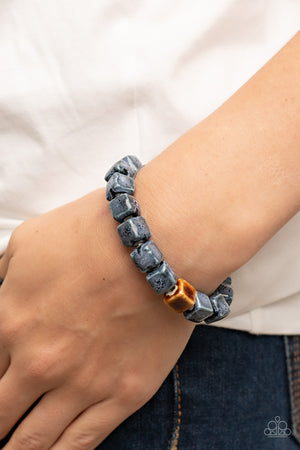 distressed blue and brown glazed finishes, a rustic collection of ceramic cube beads