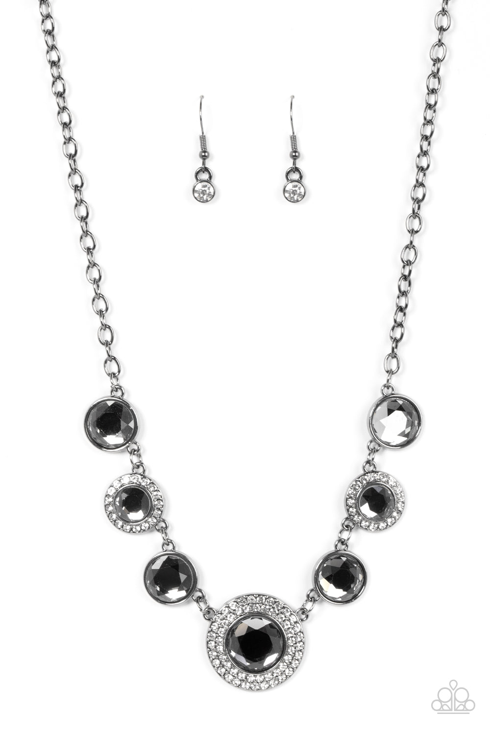 Oversized smoky gems alternate with matching gems bordered in rings of glassy white rhinestones