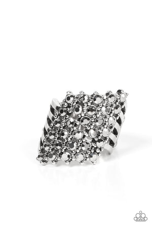 layered silver bands, rows of silver pronged hematite rhinestones slant and scatter across the finger
