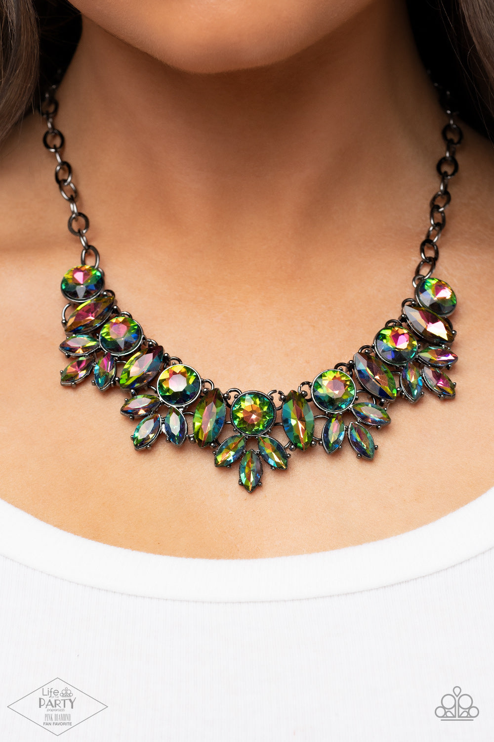 blinding series of oversized round and marquise style oil spill rhinestones dramatically link below the collar