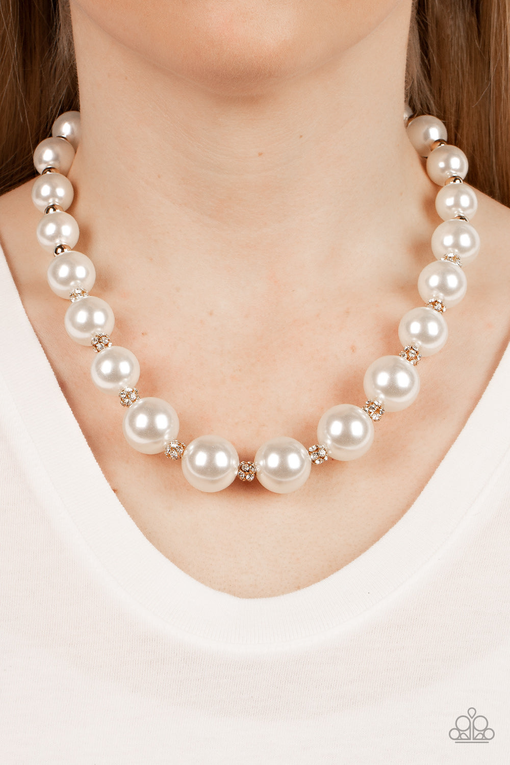 bubbly white pearls alternate with glistening gold beads and white rhinestones
