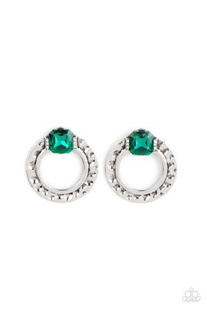  green rhinestone sparkles between two dainty rows of glassy white rhinestones atop a hammered silver ring