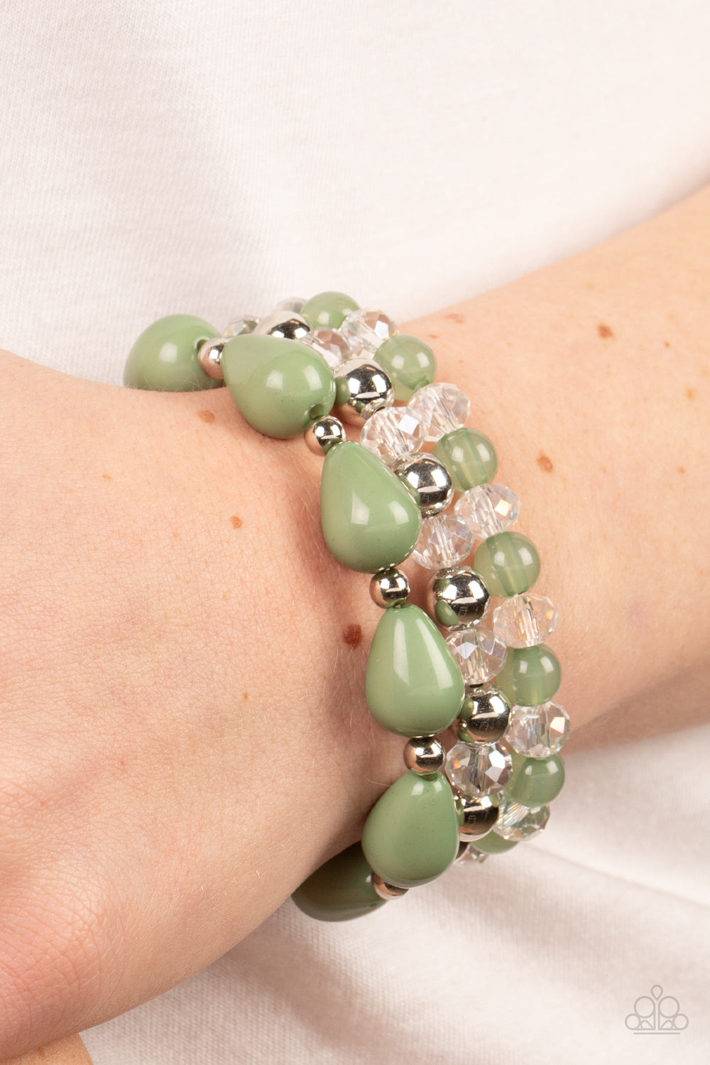 whimsical assortment of crystal-like beads, silver beads, opaque Basil beads, and Basil teardrop beads