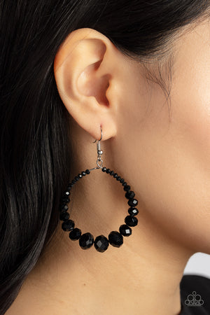 flashy faceted finish, glittery black gems gradually increase in size as they glide along a wire hoop