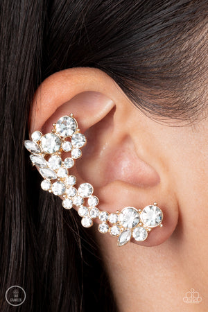 sparkly collision of round and marquise cut white rhinestones tumble down the ear, coalescing into an out-of-this-world sparkle