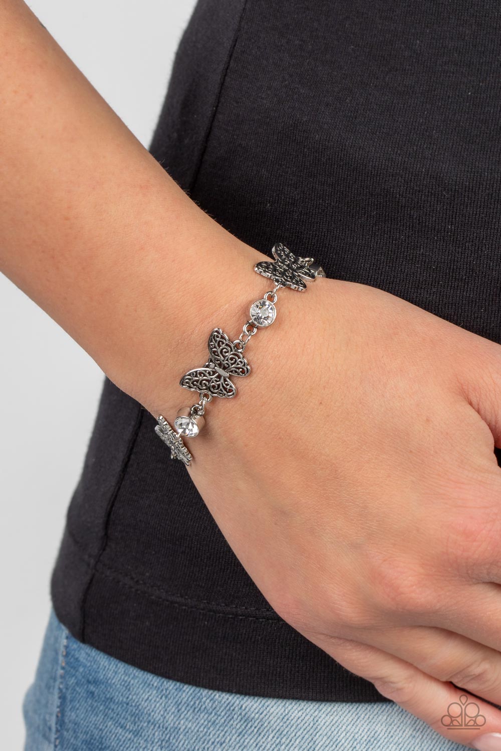 Paparazzi Has a WING to It - White Bracelet
